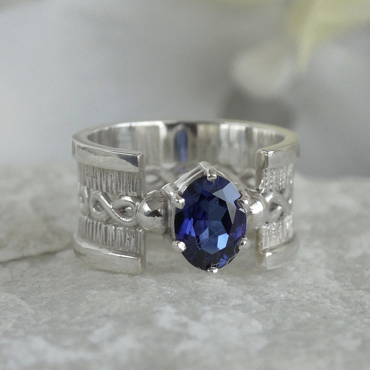anillo celta de plata 950 con piedra azul
