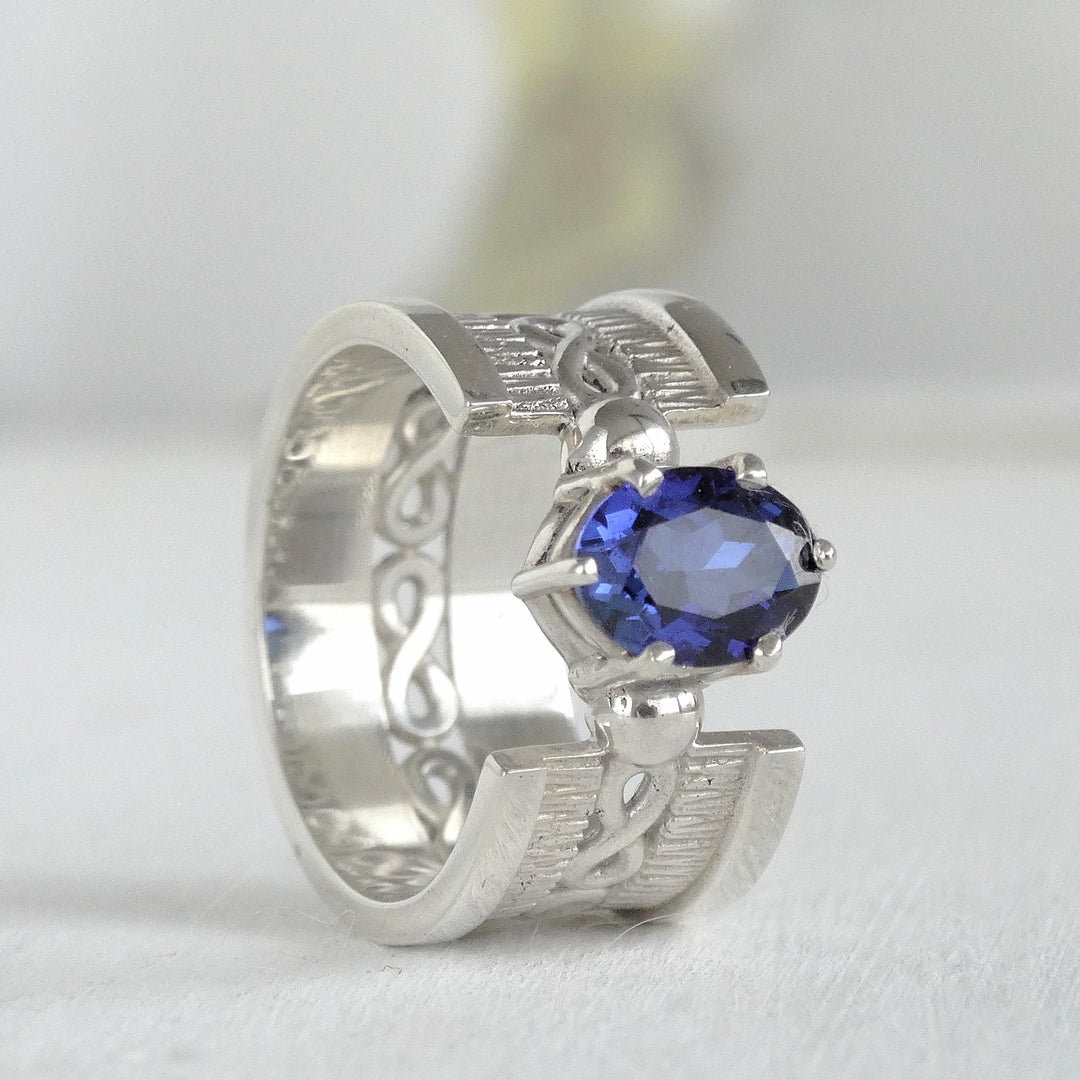anillo de plata mujer con zafiro azul
