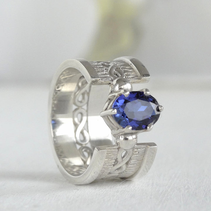 anillo de plata mujer con zafiro azul
