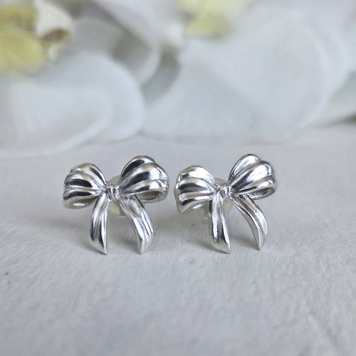 aros de plata 950 mujer en forma de lazo
