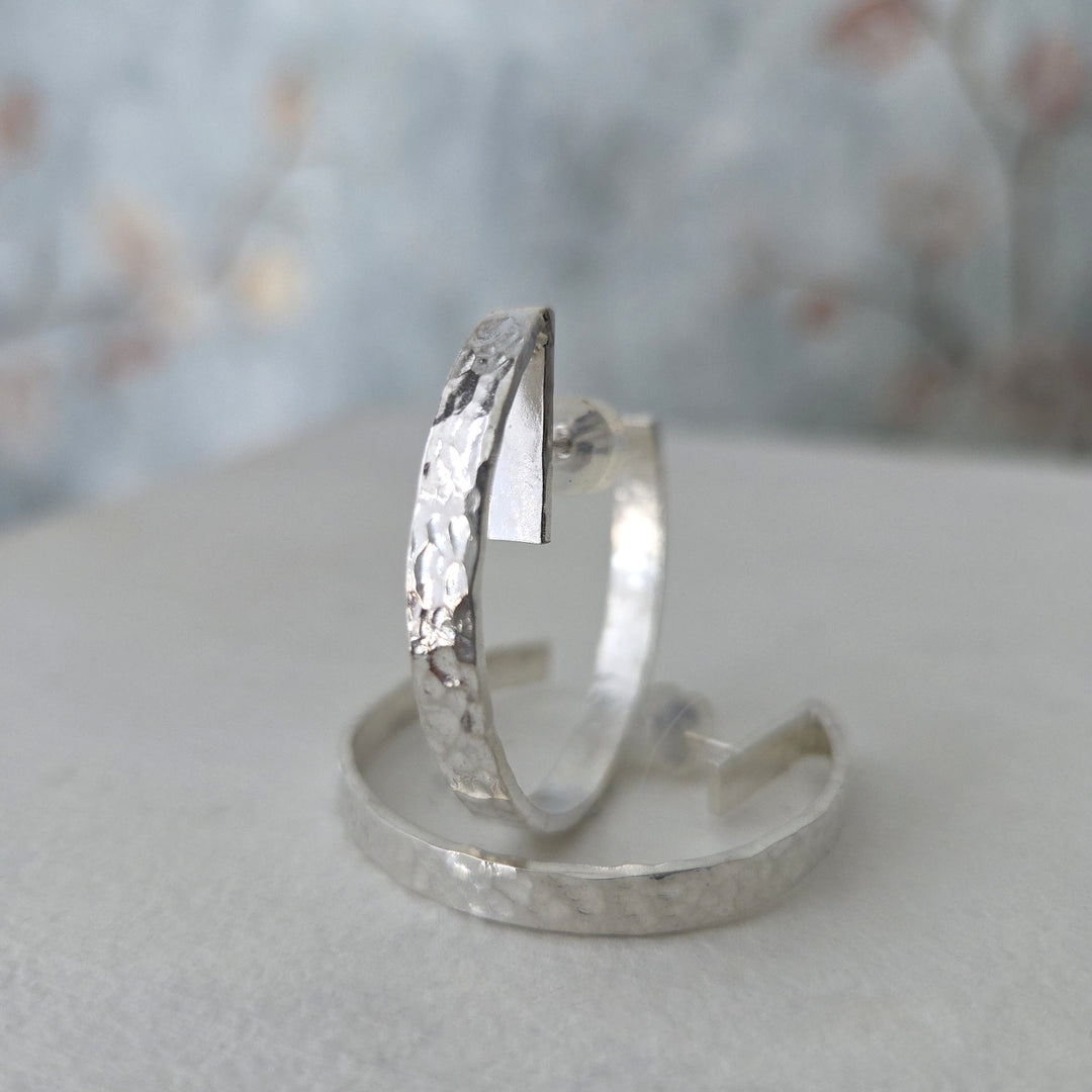 aros de plata mujer curvos
