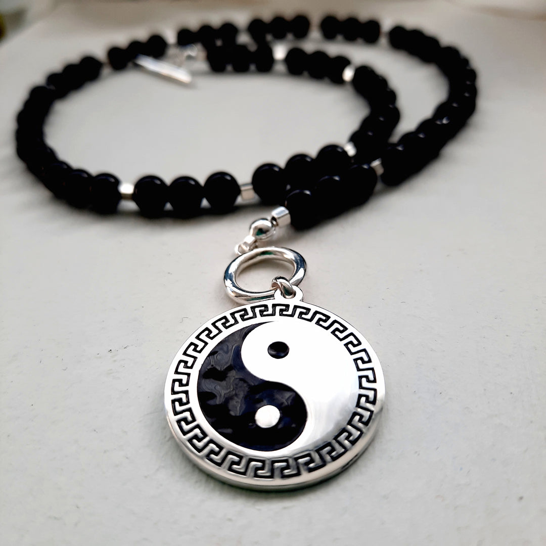 colgante ying yang en plata 950 con collar de ónix natural